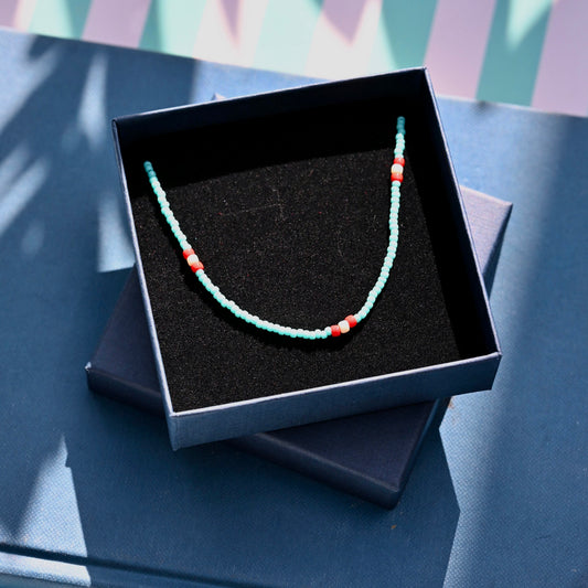 Teal and red beaded necklace