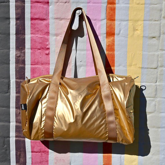 Gold weekender duffel bag