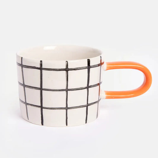 Grid mug with orange handle