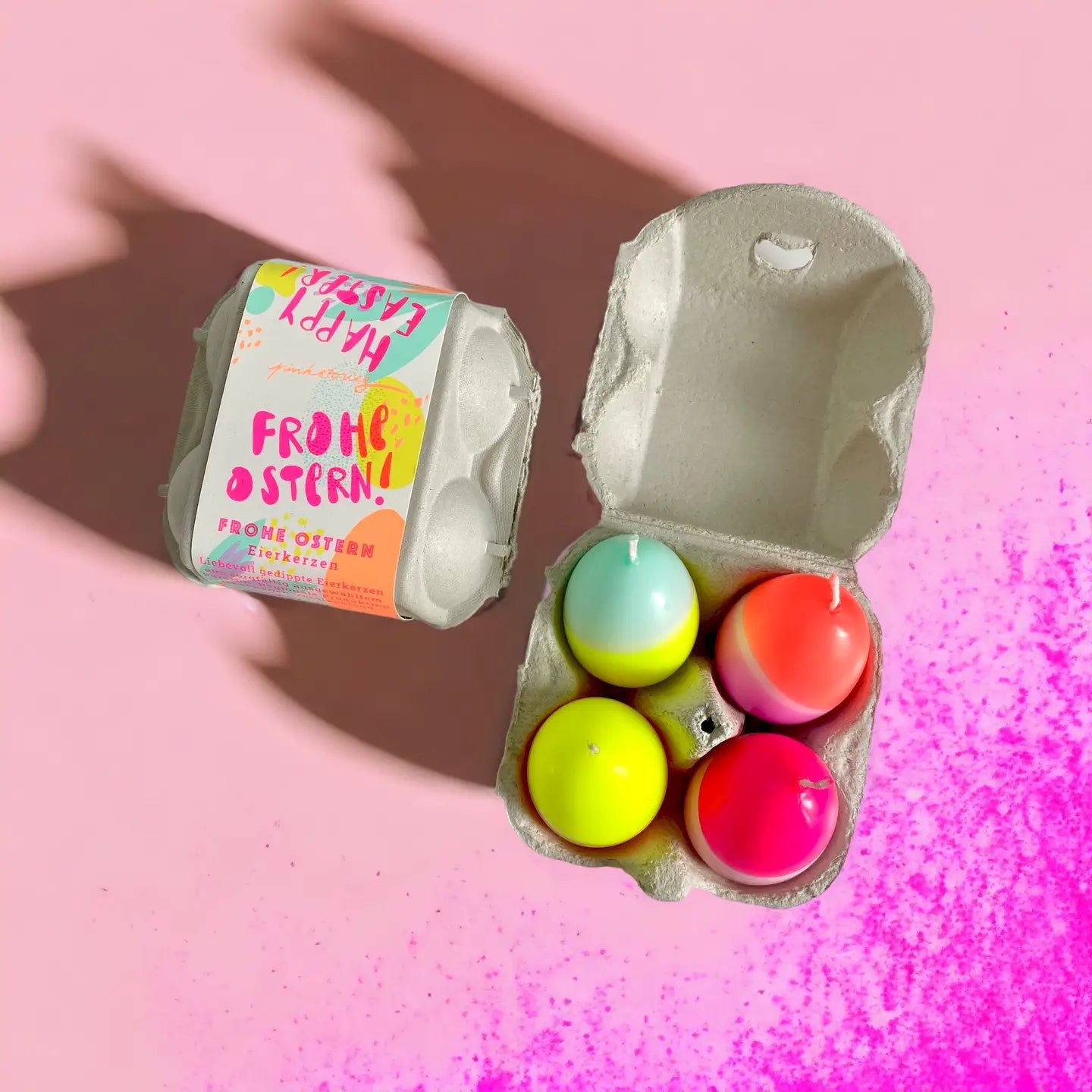 4 neon egg candles in carton
