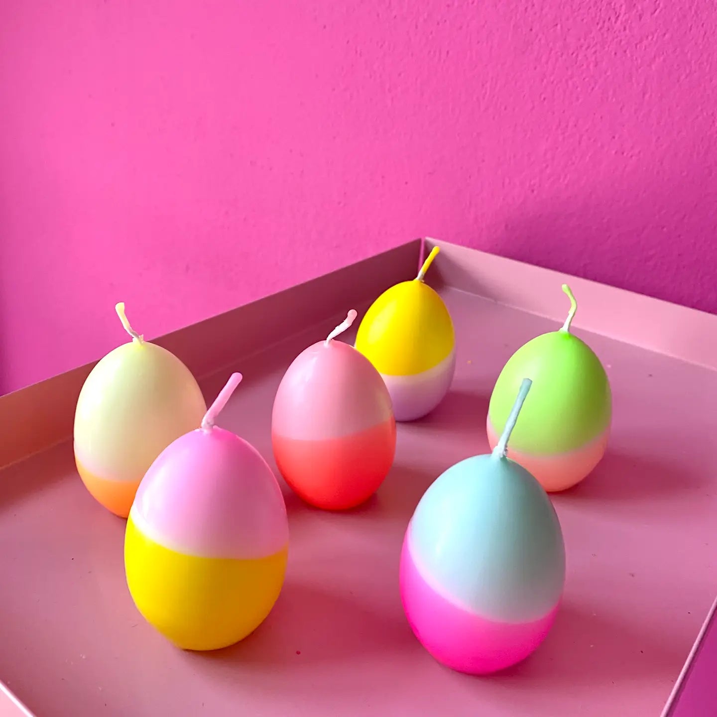 6 neon egg candles in carton