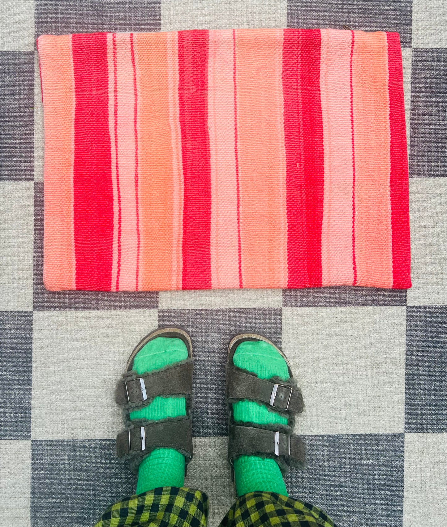 Coral and red stripe cushion