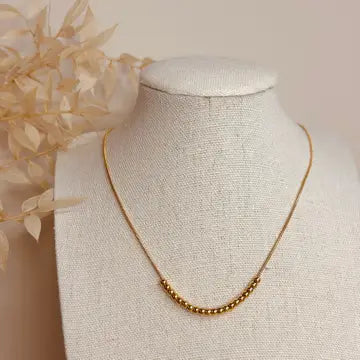 Gold beaded abacus necklace