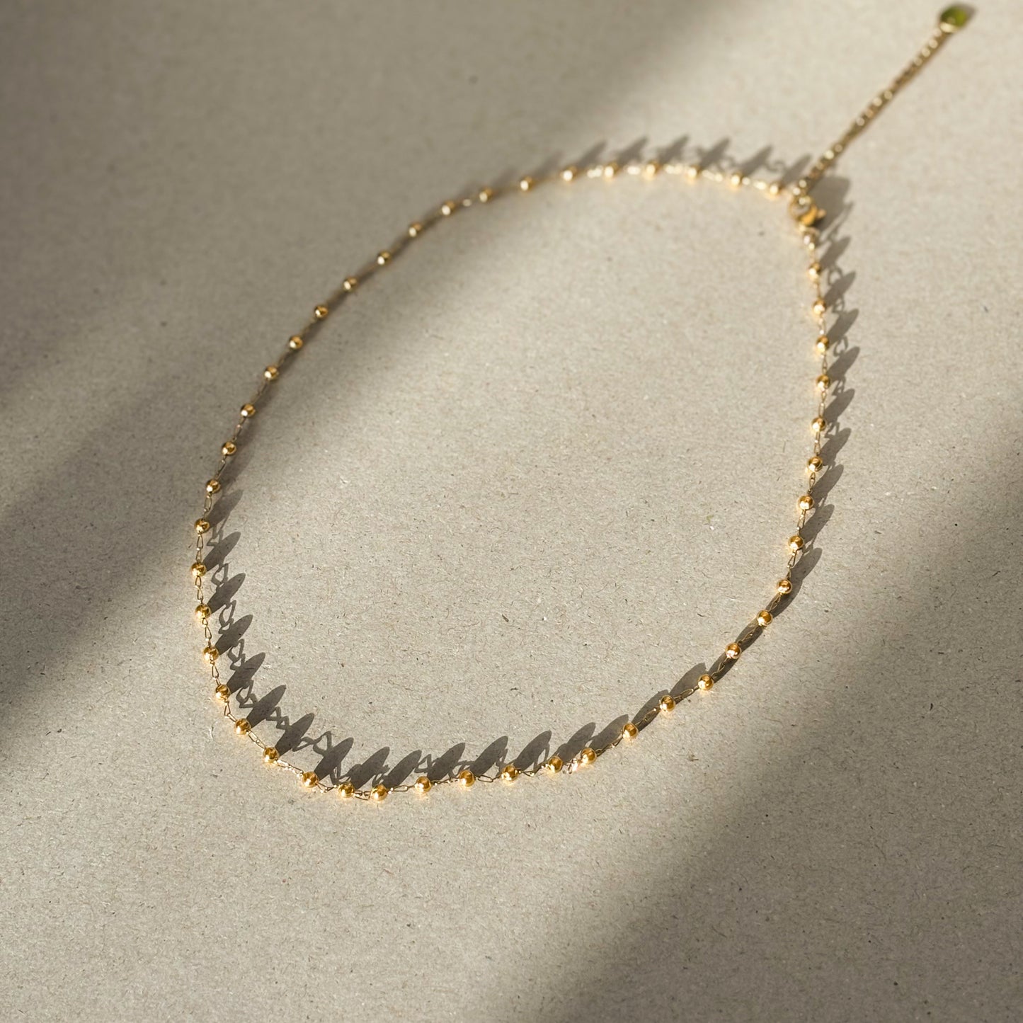 Beaded necklace with mini balls