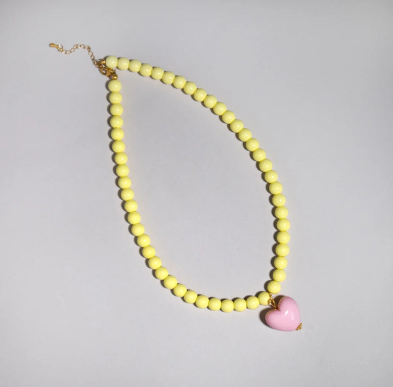 Yellow bead and pink heart necklace