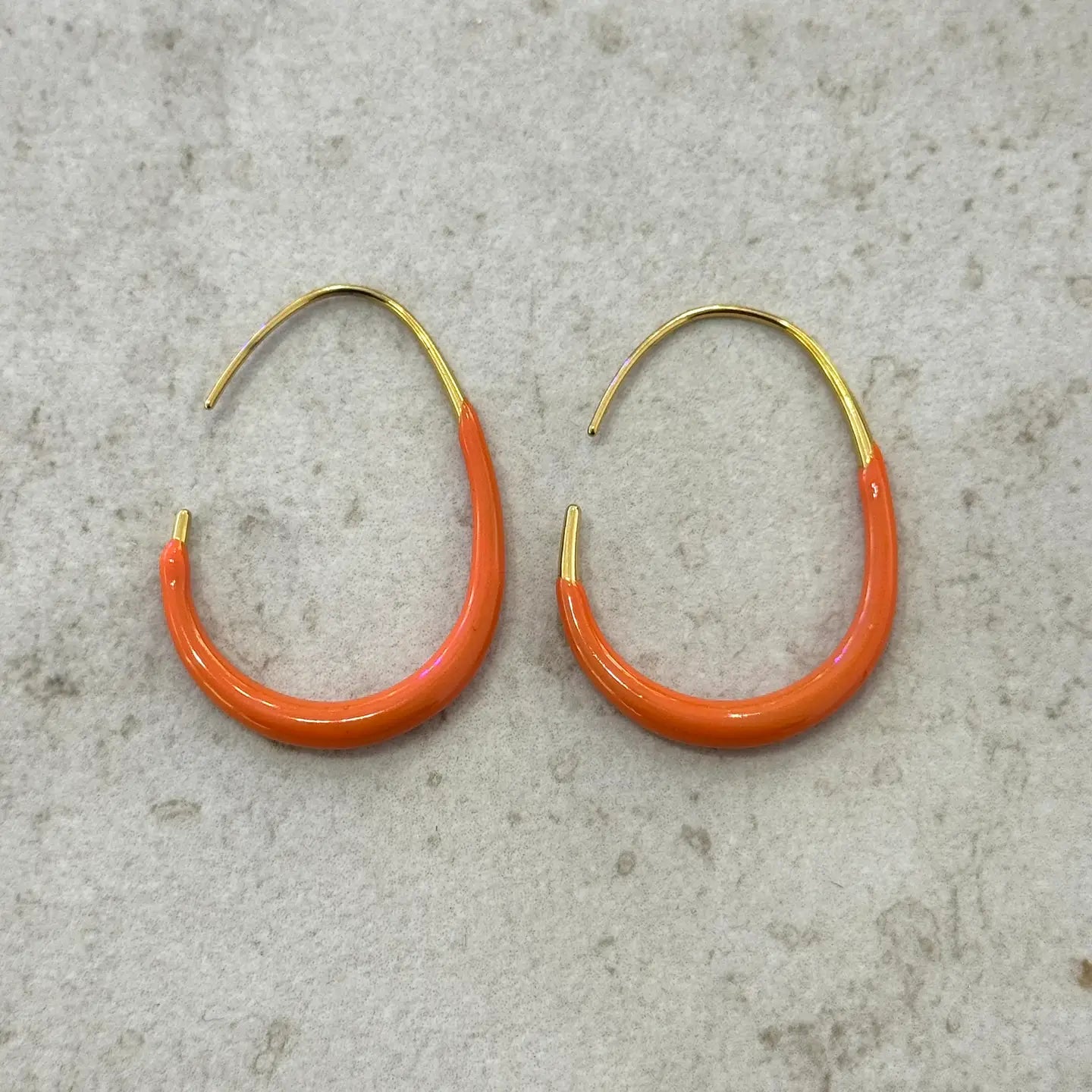 Enamel dipped oval hoop earrings