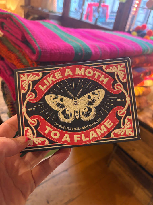 Moth to a flame matchbox