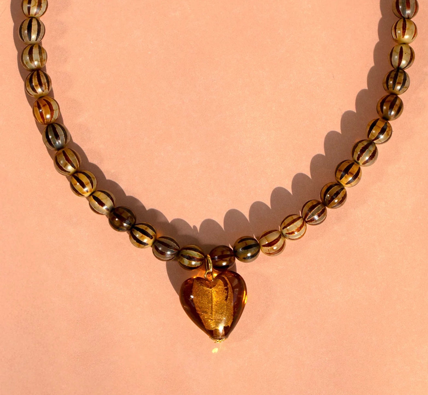 Amber heart and gemstone stripe bead necklace