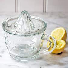 Glass lemon juicer and jug