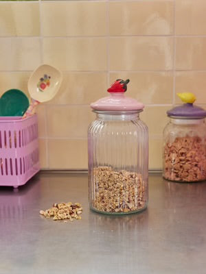 Glass jar with strawberry lid