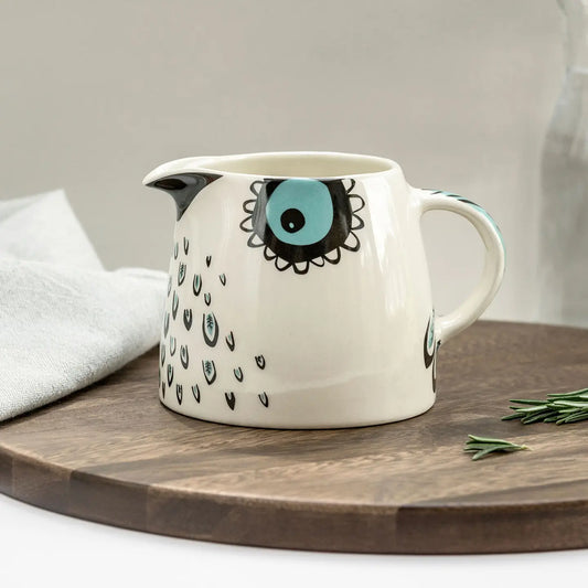 Ceramic owl milk jug