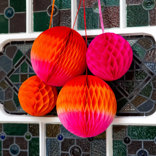 Orange and pink ombré honeycomb decorations