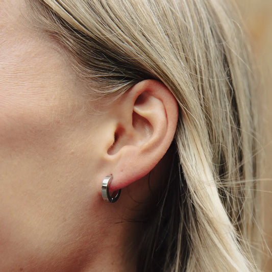 Silver flat huggie earrings