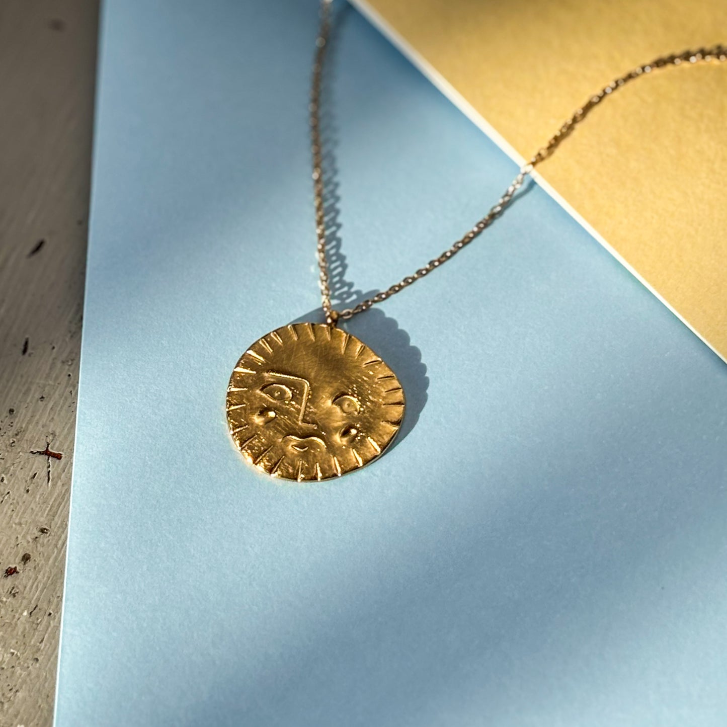 Antique sun pendant necklace