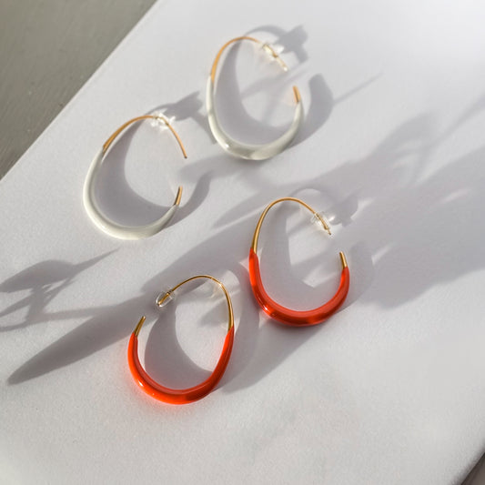 Enamel dipped oval hoop earrings