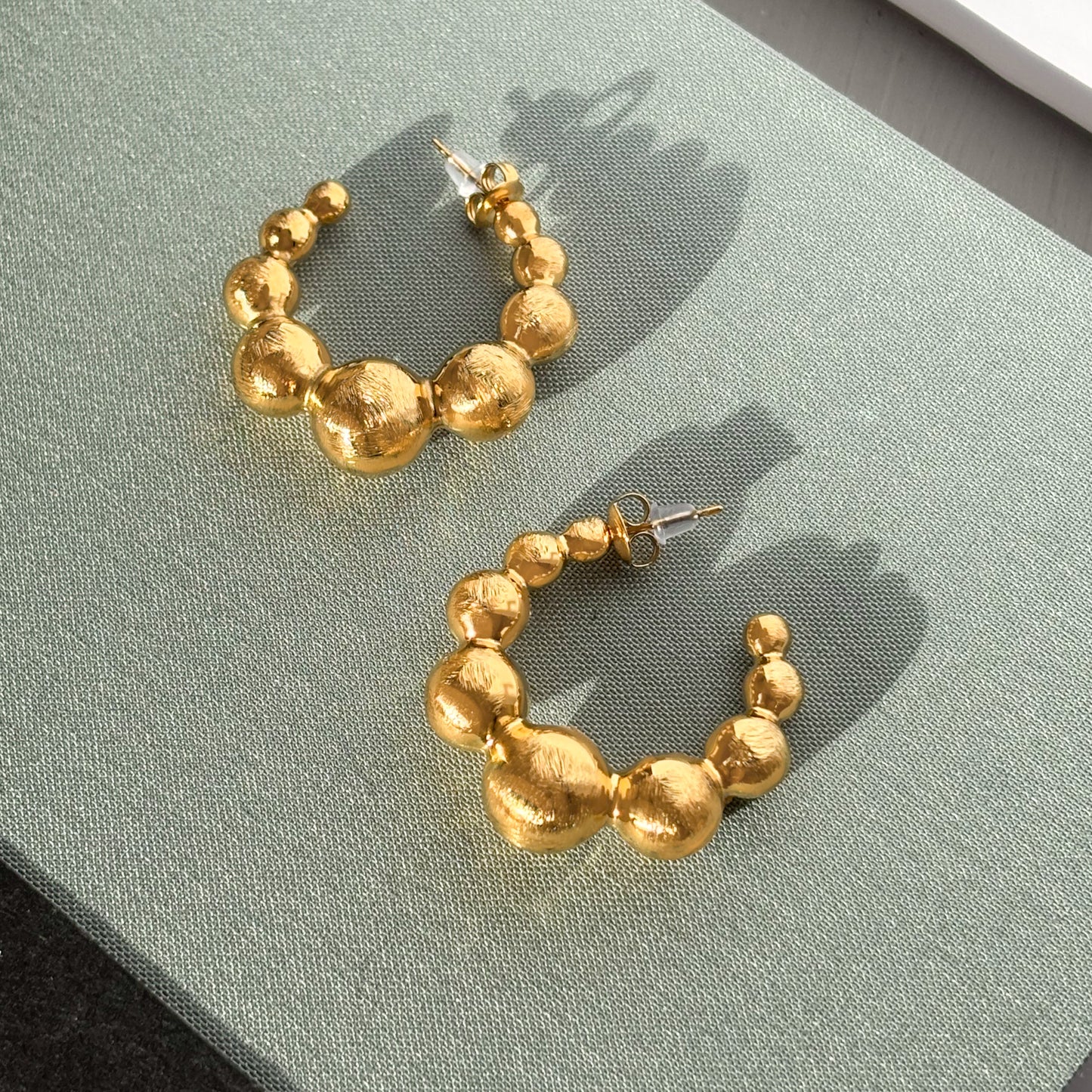 Gold beaded hoop earrings