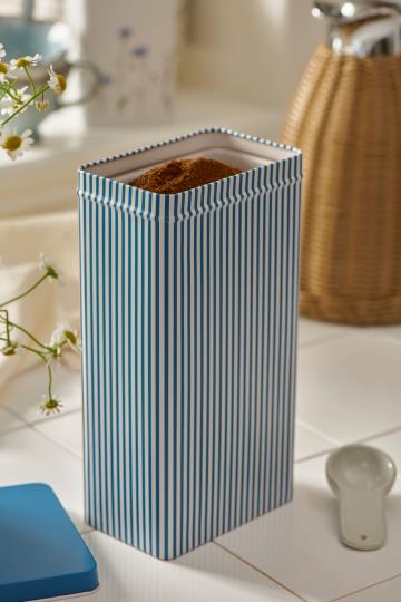 Tall stripy tin canister