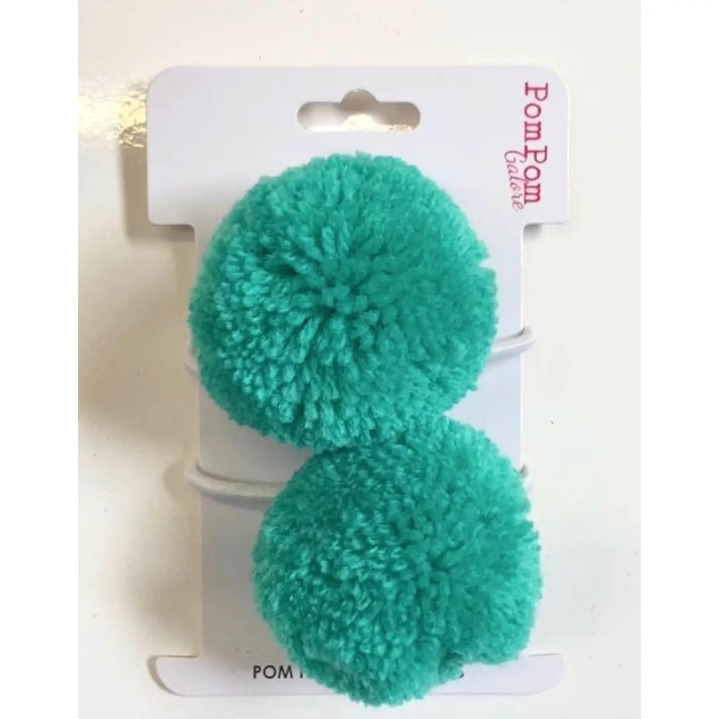 Pair of pompom hairbands