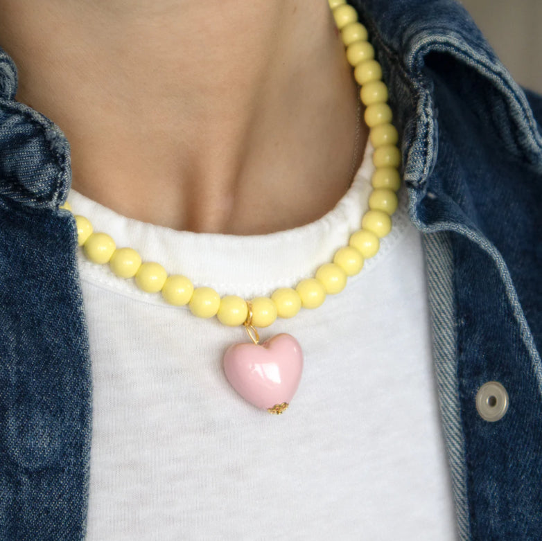 Yellow bead and pink heart necklace
