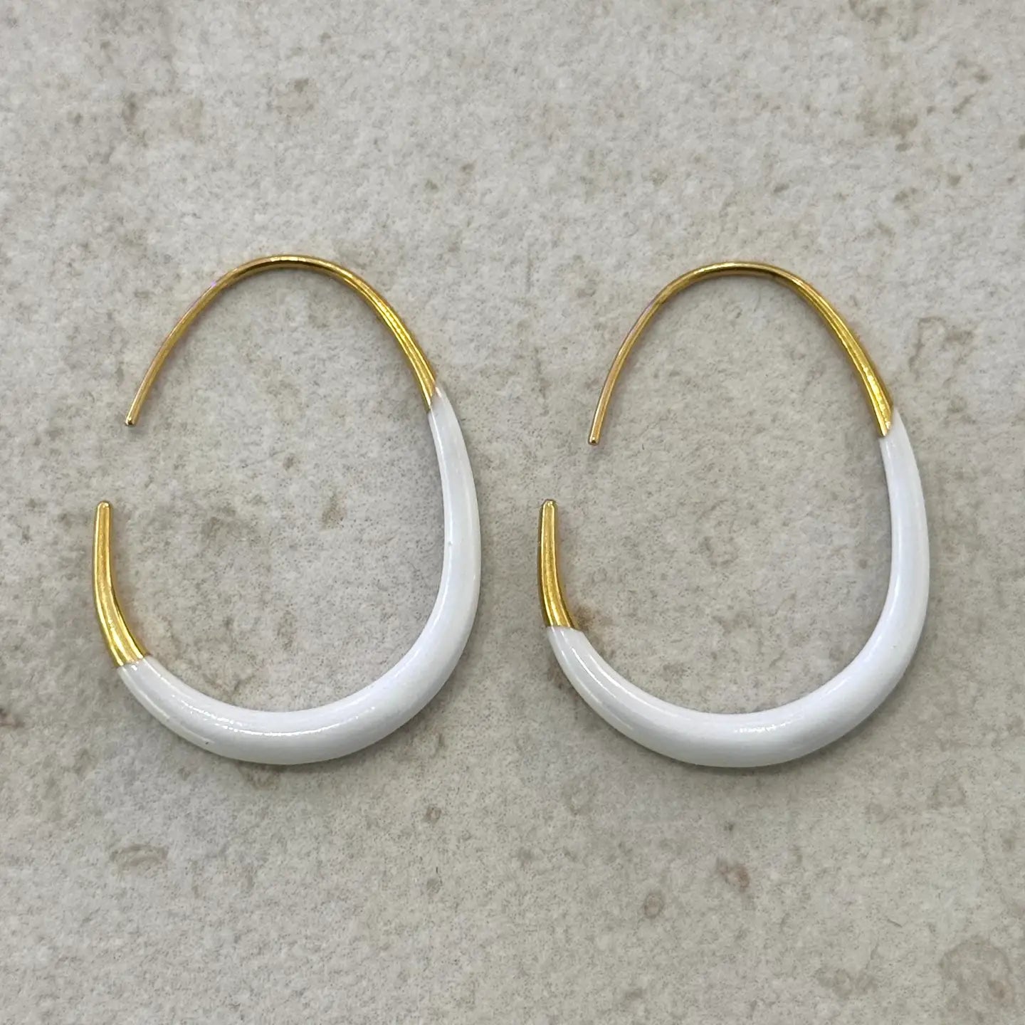 Enamel dipped oval hoop earrings