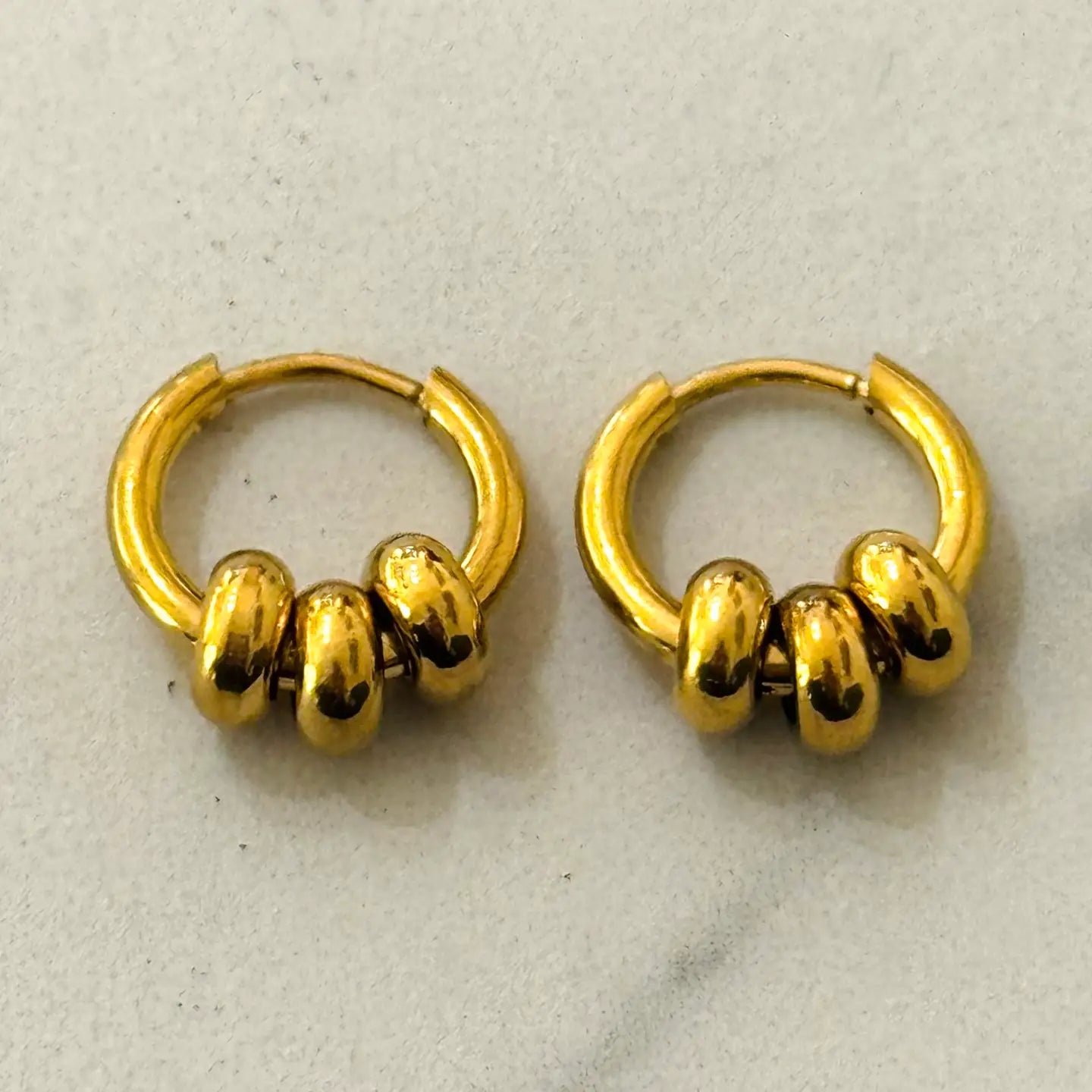3 ball huggie hoop earrings
