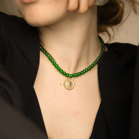 Dark jade green beaded necklace with heart coin