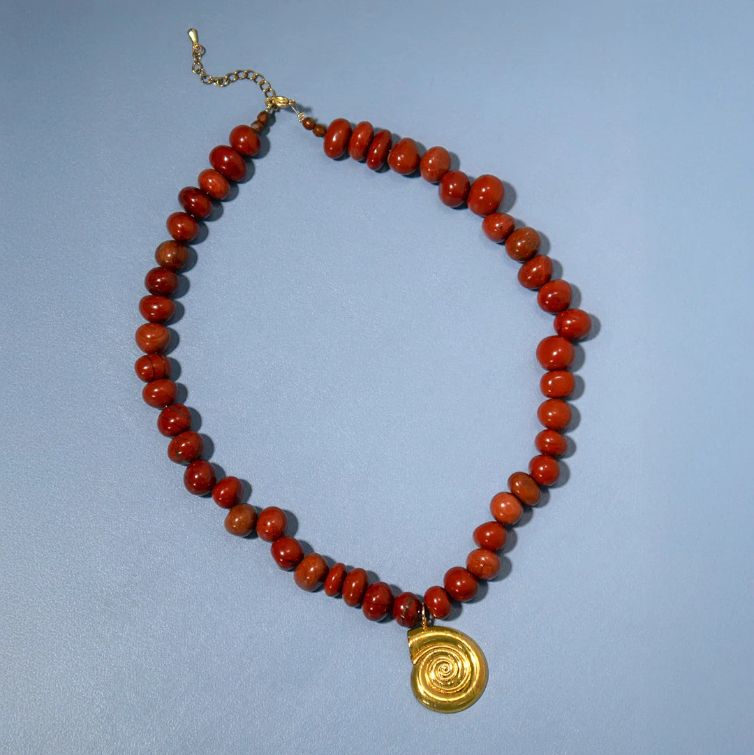 Chestnut pebble bead and gold shell necklace