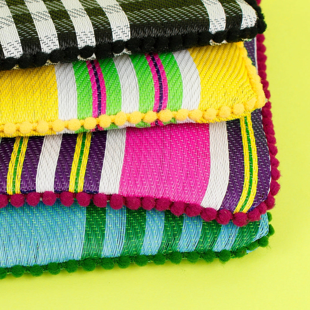 Woven stripy pompom pouch