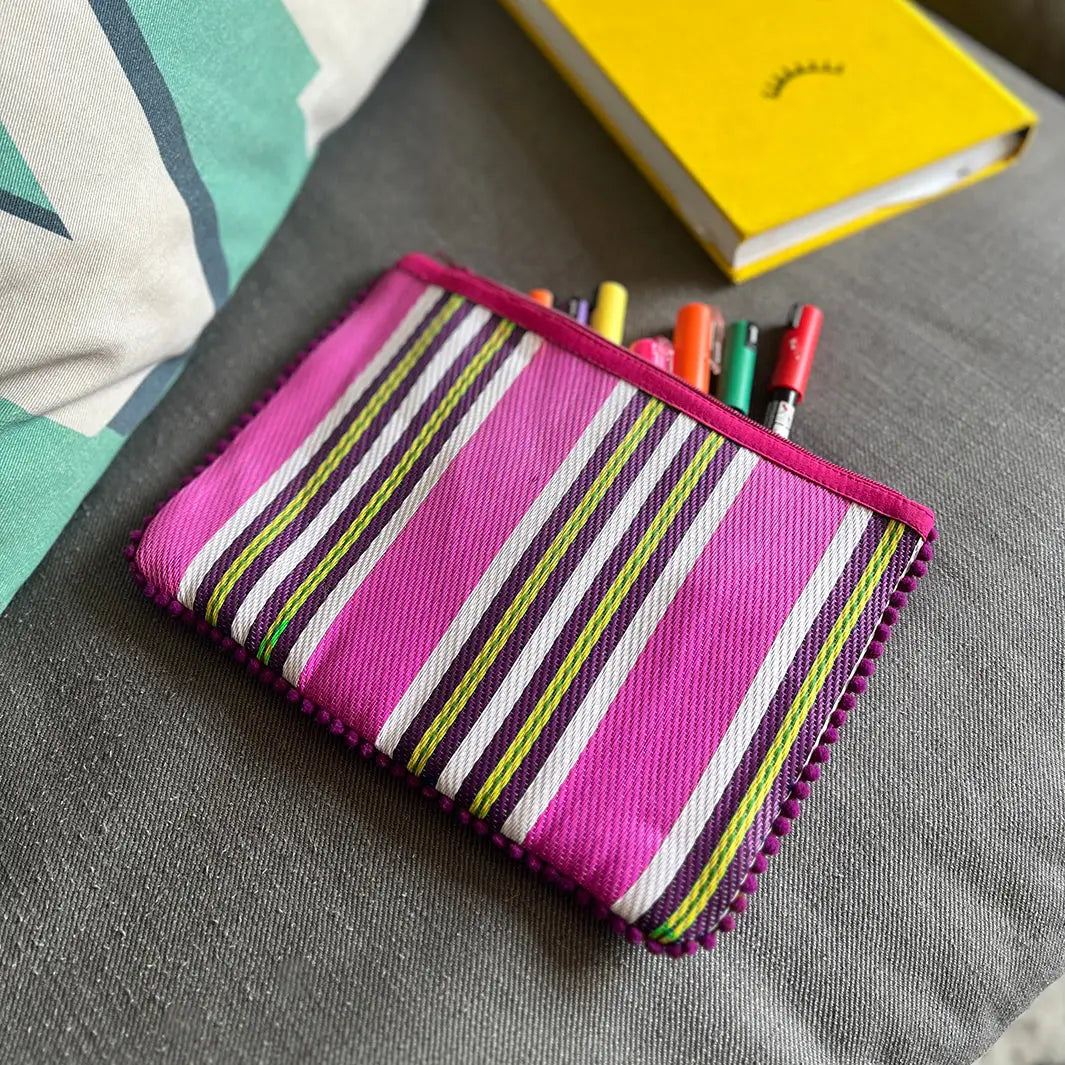 Woven stripy pompom pouch