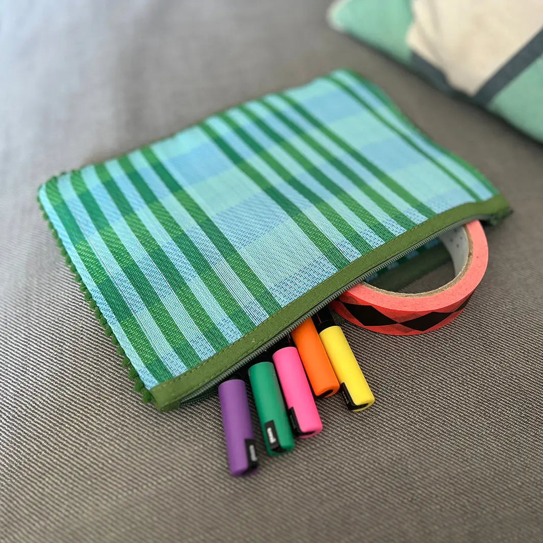 Woven stripy pompom pouch