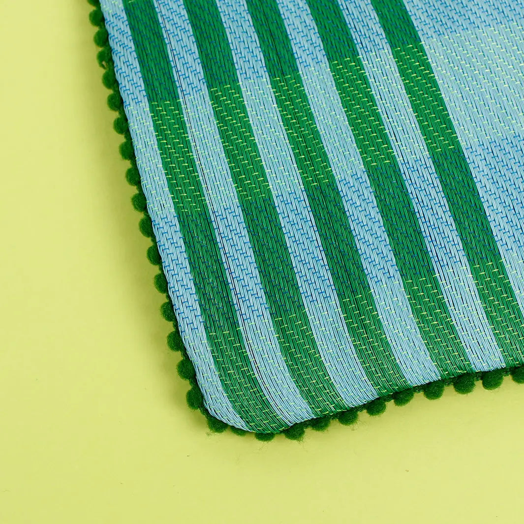 Woven stripy pompom pouch