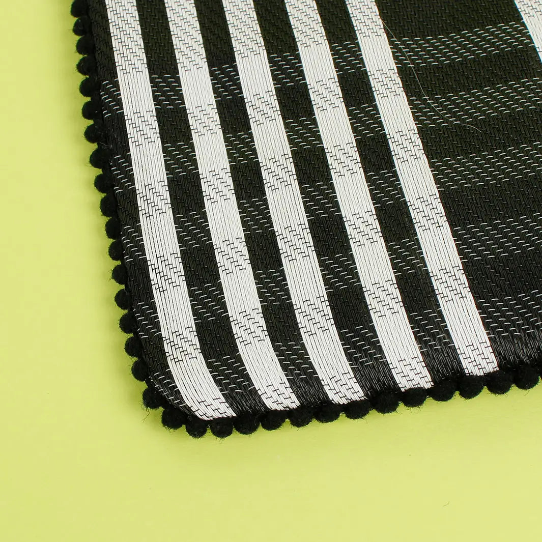 Woven stripy pompom pouch