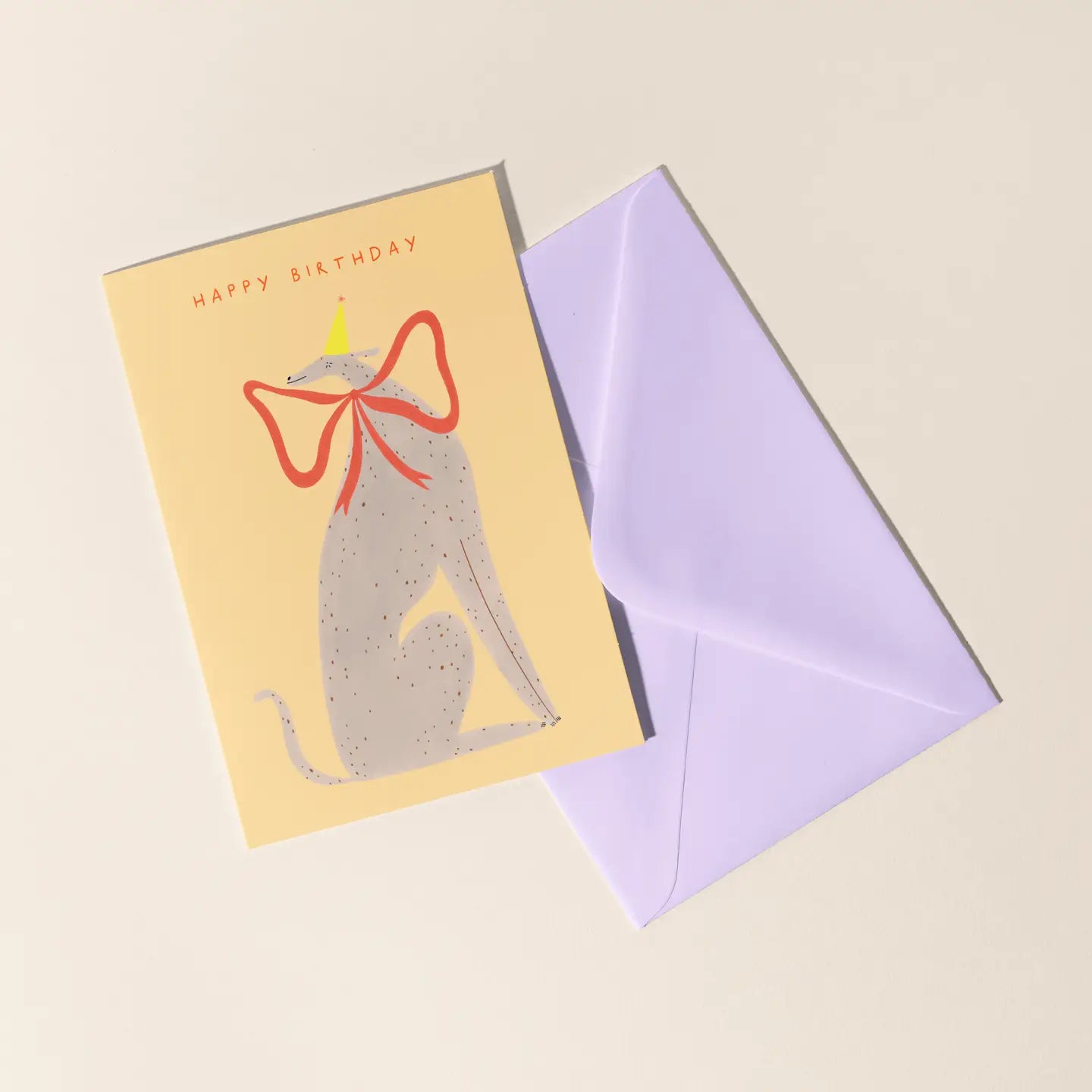 Dog with bow birthday card