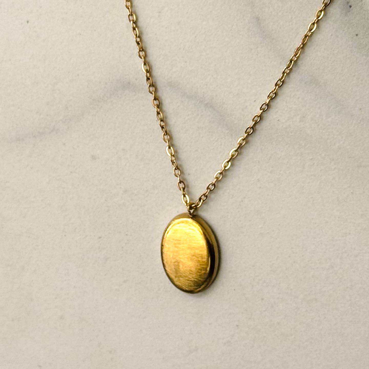 Gold medallion necklace