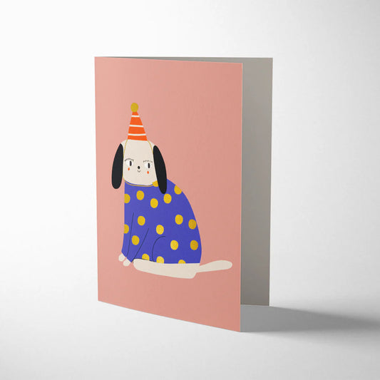 Dog in a party hat birthday card
