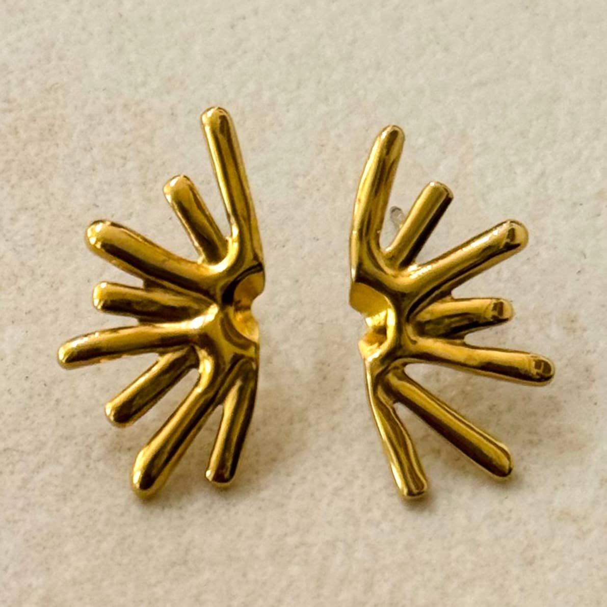 Half sun stud earrings