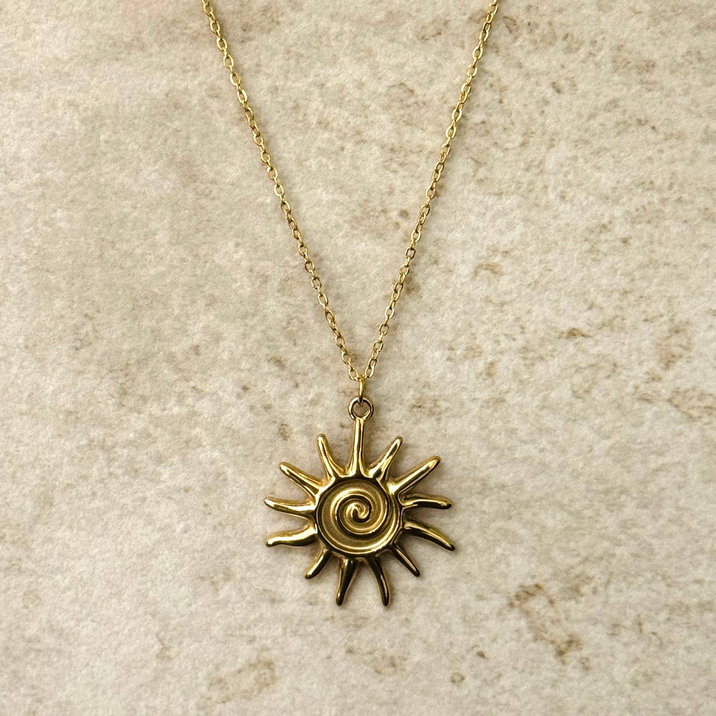 Tribal sun pendant necklace