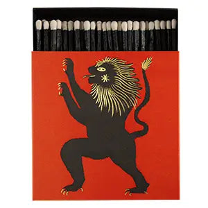 Black lion on red matches