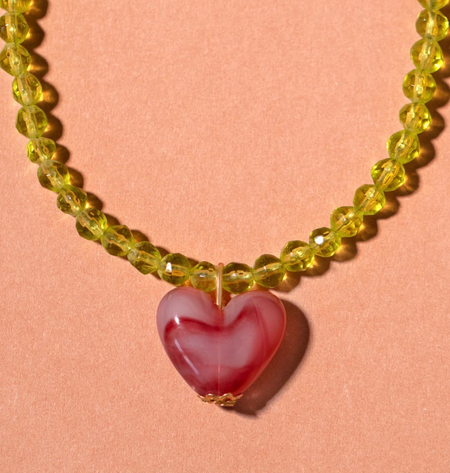 Pistachio bead and raspberry heart necklace