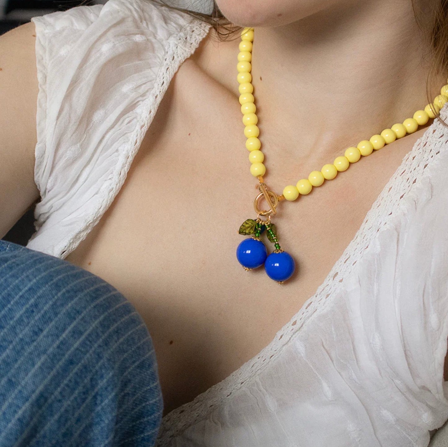 Yellow and blue cherry bead necklace