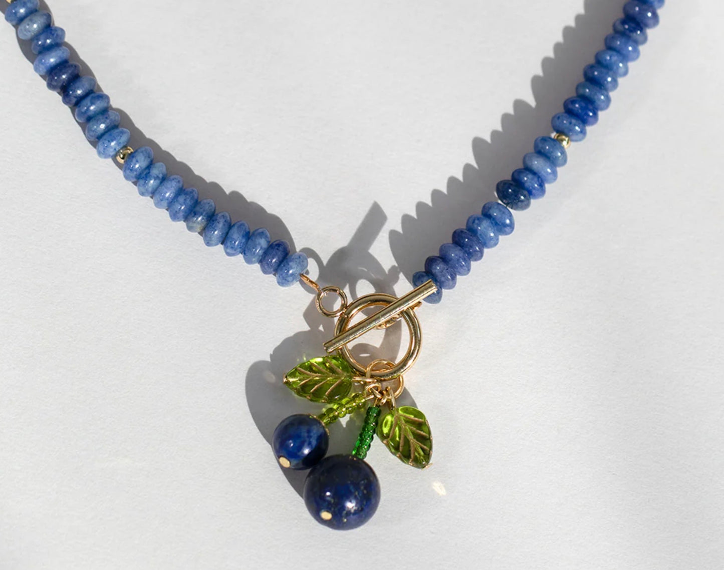 Blue gemstone cherry bead necklace