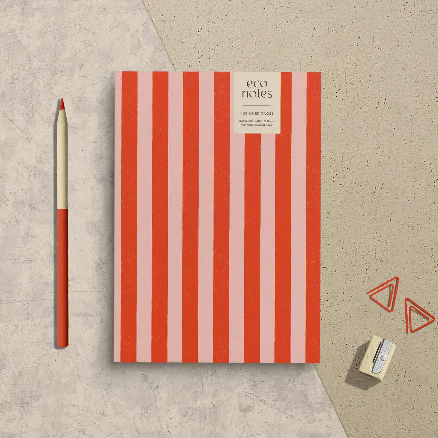 Red and pink candy stripe notebook