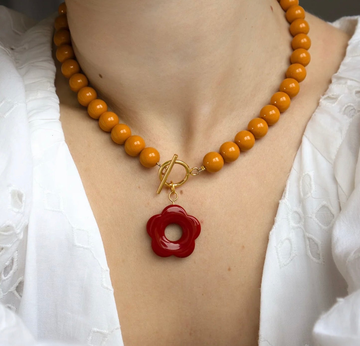 Mustard bead and cranberry flower toggle necklace