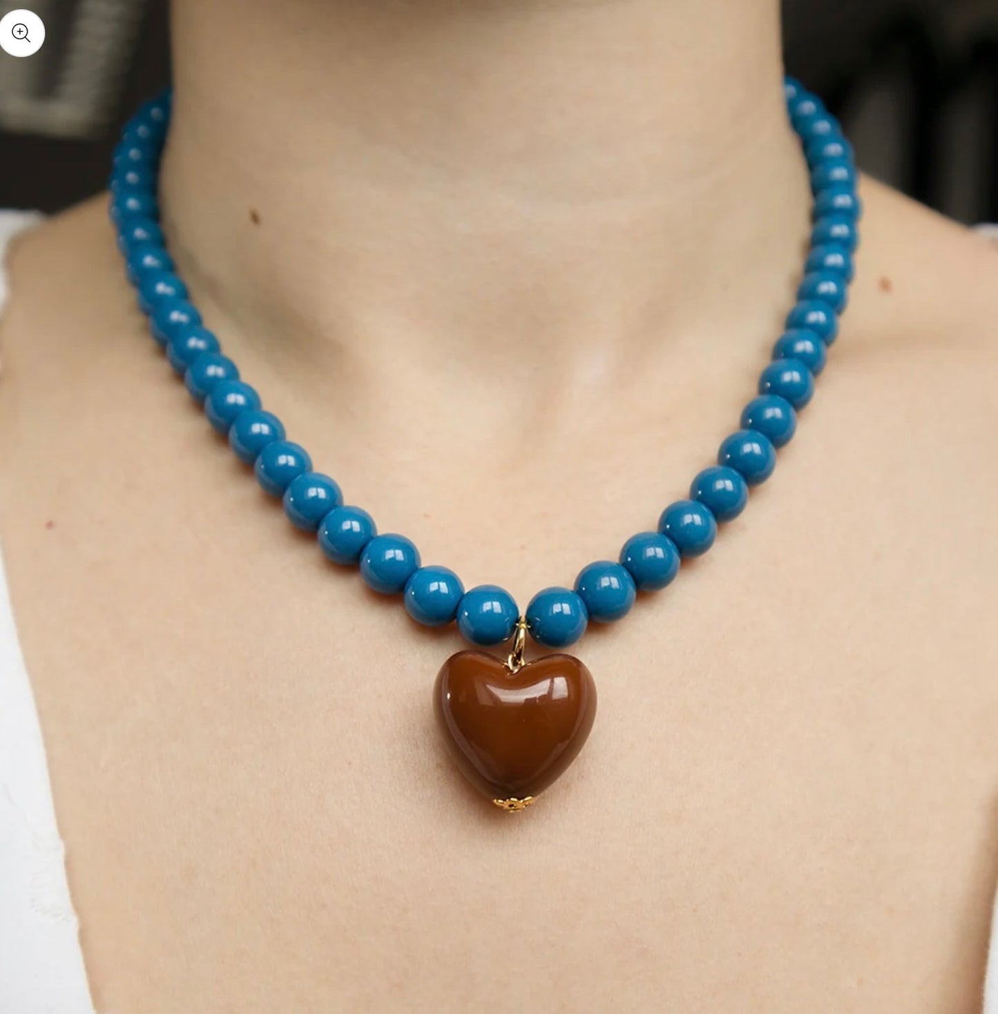 Peacock blue bead and chocolate heart necklace
